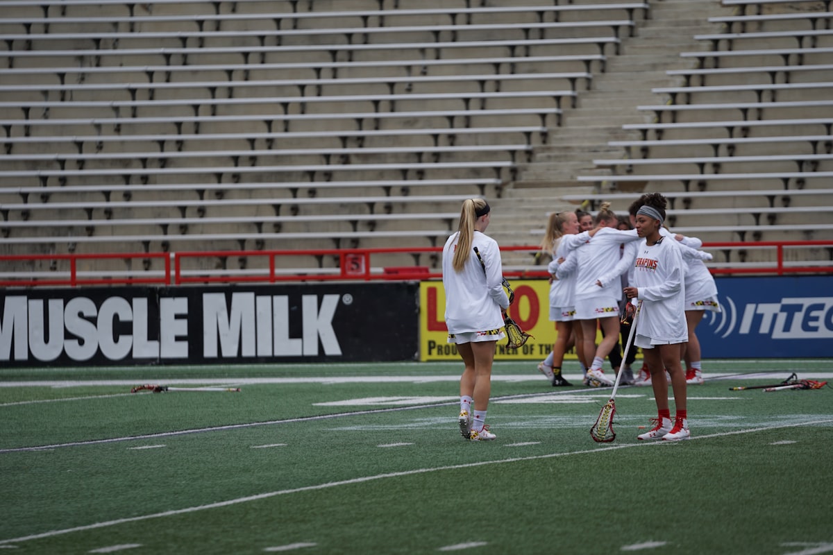 Professional athletic trainer coaching athlete